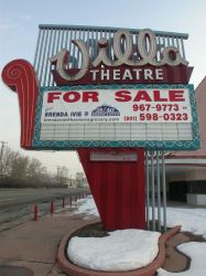 'For Sale' banner on the Villa Theatre's sign in 2004