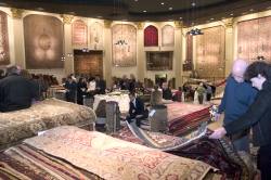 Visitors examine rug, Villa Theatre, Salt Lake City, Utah